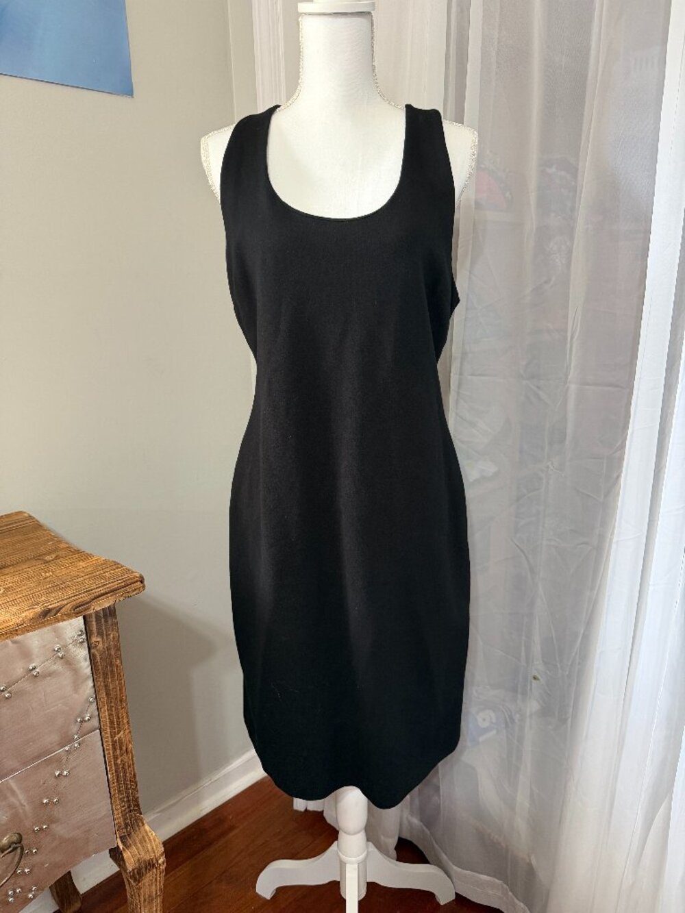 Classic and flattering Boston Proper black sleeveless sheath dress in size 10.